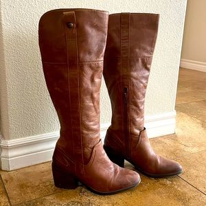 Soft leather, side zipper, great condition only worn a few times.